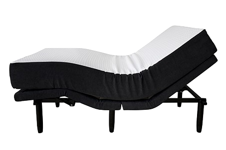 A realistic bedroom scene showing a split king adjustable bed with two separate remotes on each side, one side slightly raised at the head and the other flat, with warm lighting and cozy bedding. Alt: Split king adjustable bed with dual remotes for partners with different sleep positions.