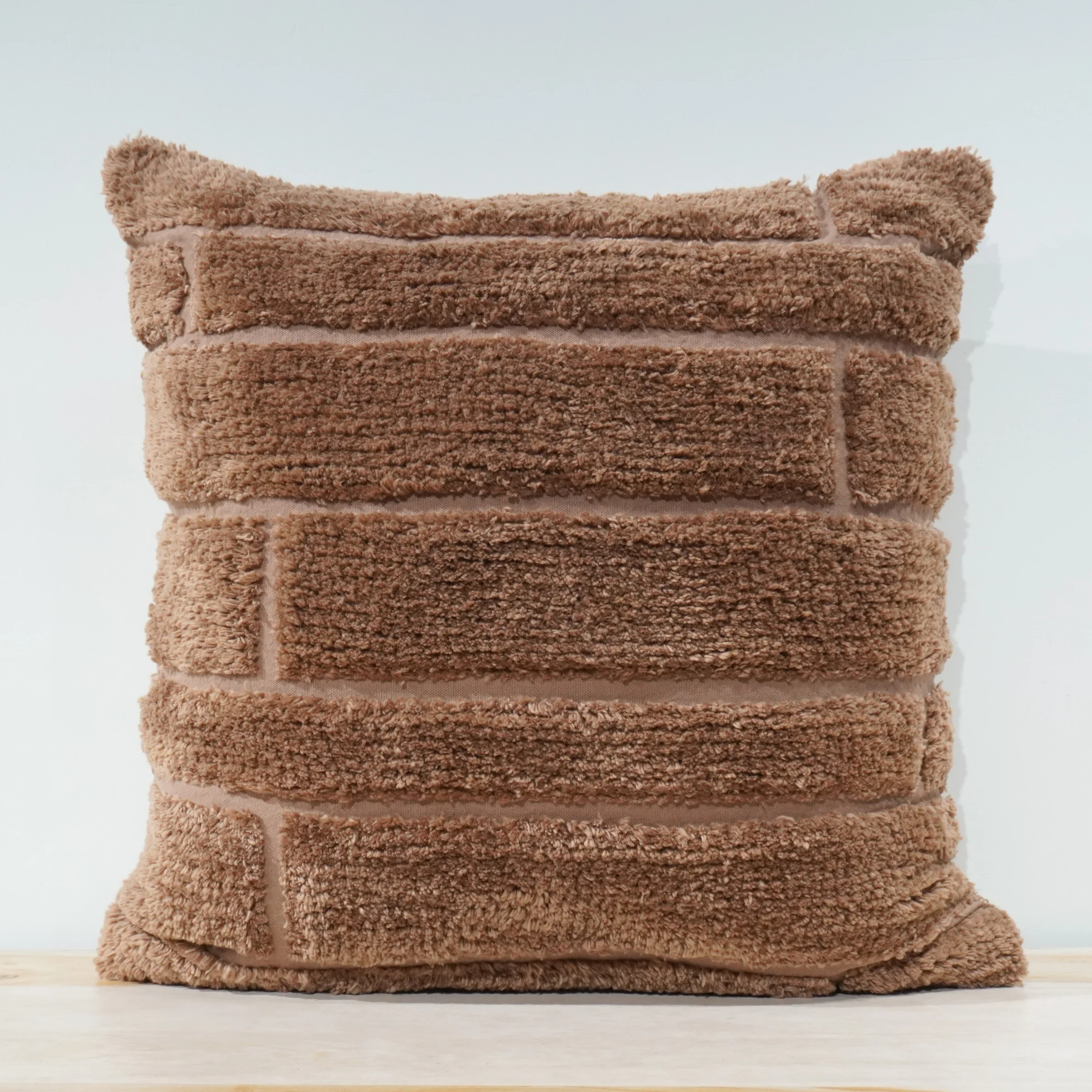 Square mocha chenille pillow cover tufted in an offset brick pattern, tone on tone