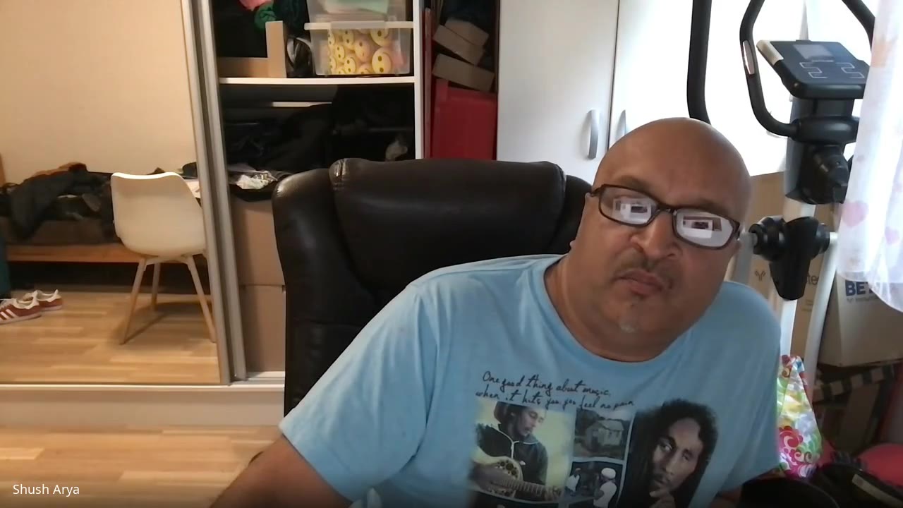 Shush Arya speaking on a video call