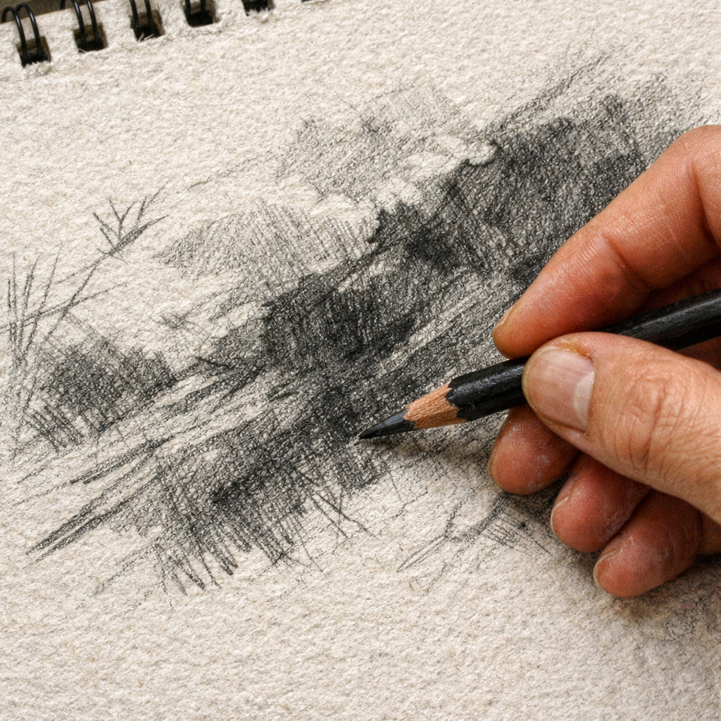 drawing on rough textured paper with graphite