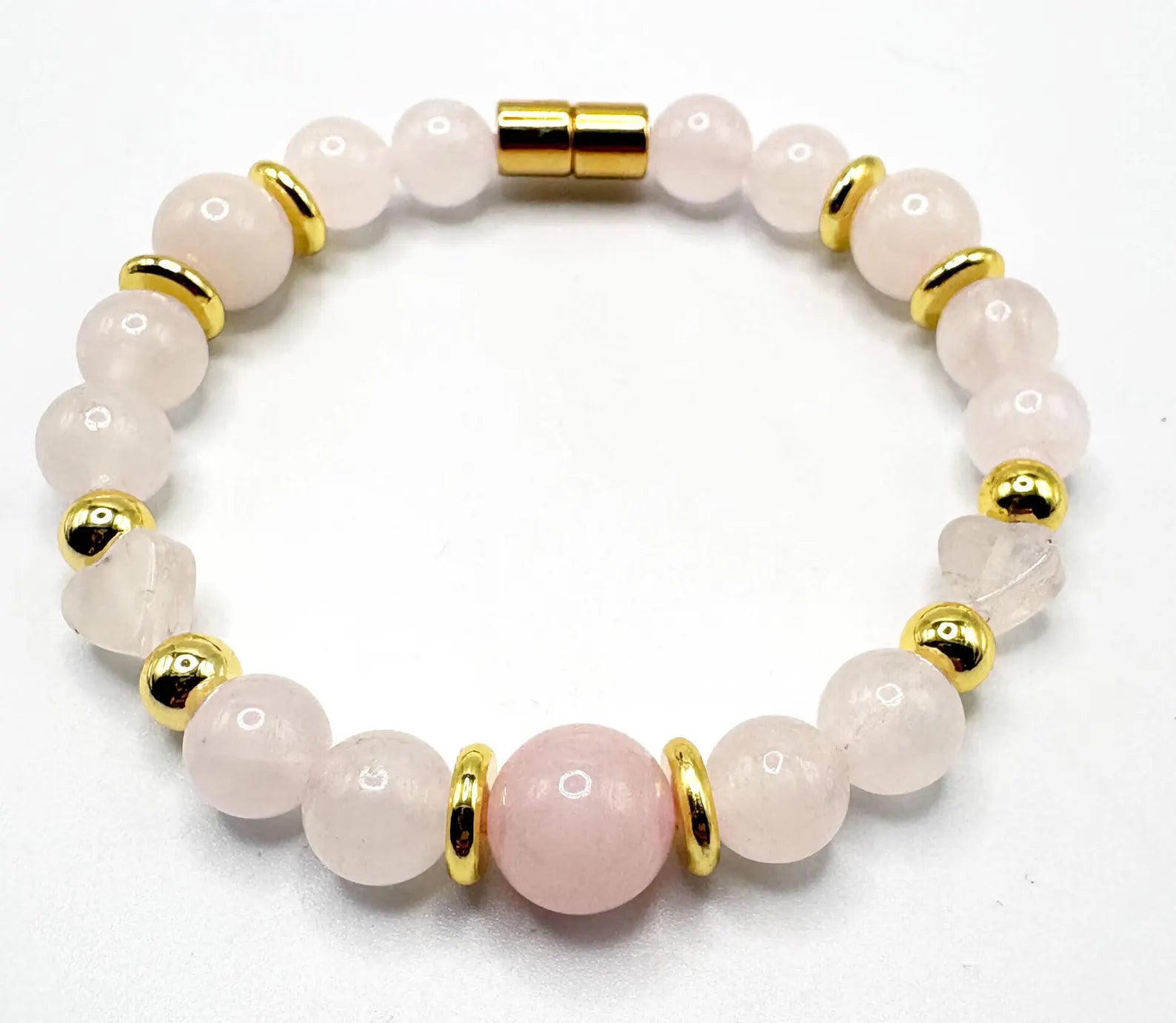 A photorealistic close‑up of a rose quartz crystal bracelet draped over a soft linen pillow, warm evening light highligh