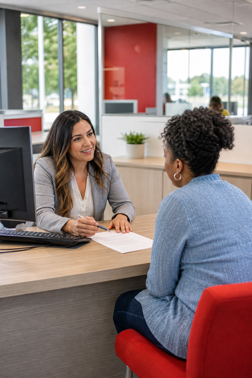 credit union member discussing small personal loan options with a loan officer.