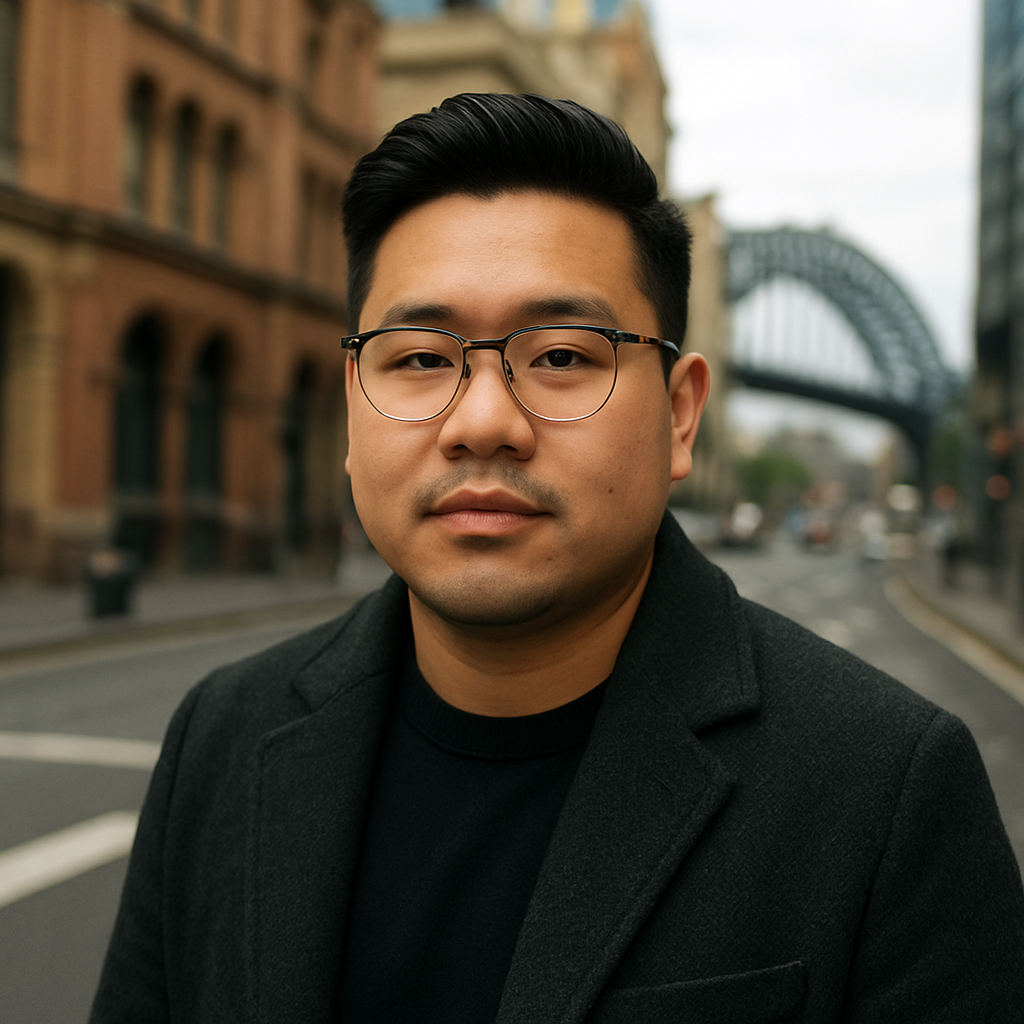 A stylish man with a round face wearing semi‑rimless glasses, urban street background in Sydney. Alt: Semi-rimless eyeglasses for round face men