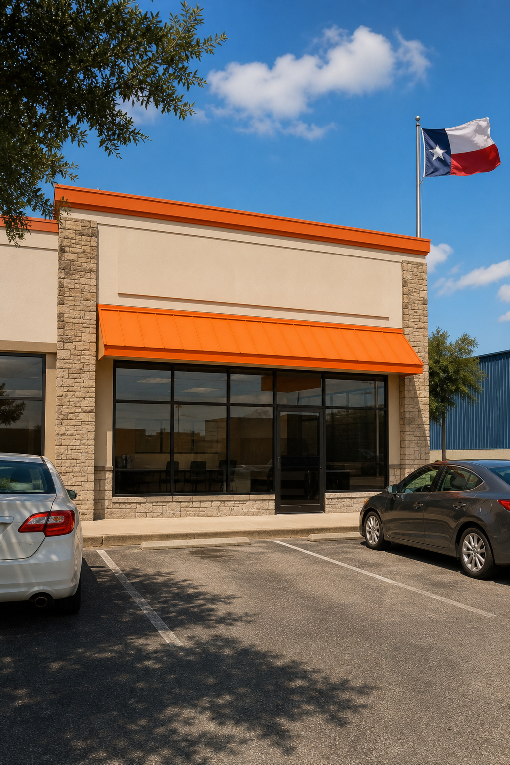 A photorealistic exterior shot of a Texas lending storefront on a sunny day, with a parking lot visible and a warm orange-toned sign, conveying a local small-business feel without any readable phone numbers or signage text. Alt: Local Texas car title and payday loan storefront serving Texas residents.