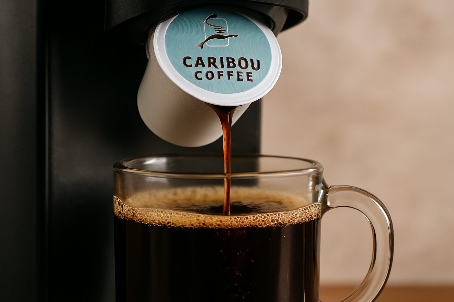Close-up of Caribou Coffee K-Cup pouring black coffee into a glass mug. Alt: Best coffee pods delivering rich black coffee flavor.