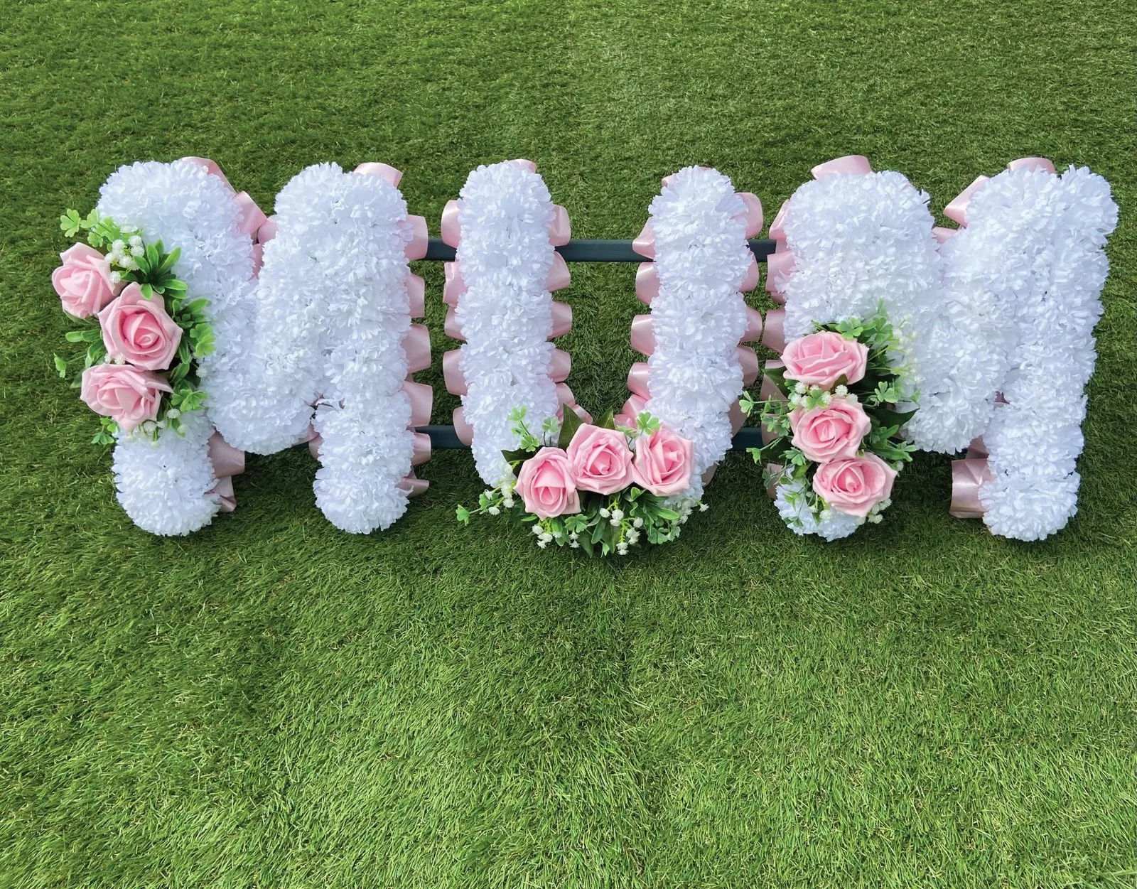 Weather-resistant heart-shaped silk grave flowers in Eltham
