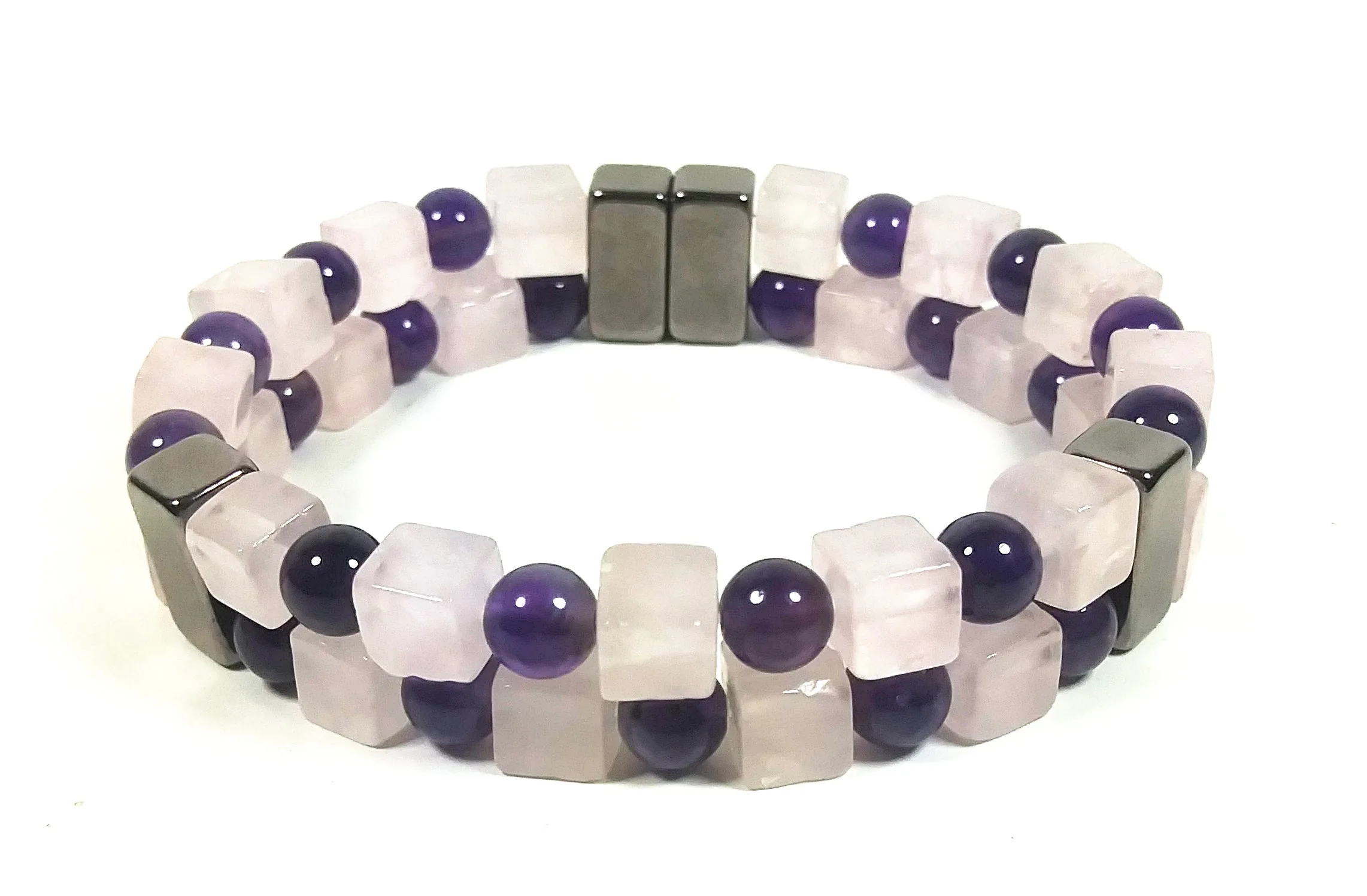 Healing stone jewelry arranged by intention for clarity calm love confidence and grounding