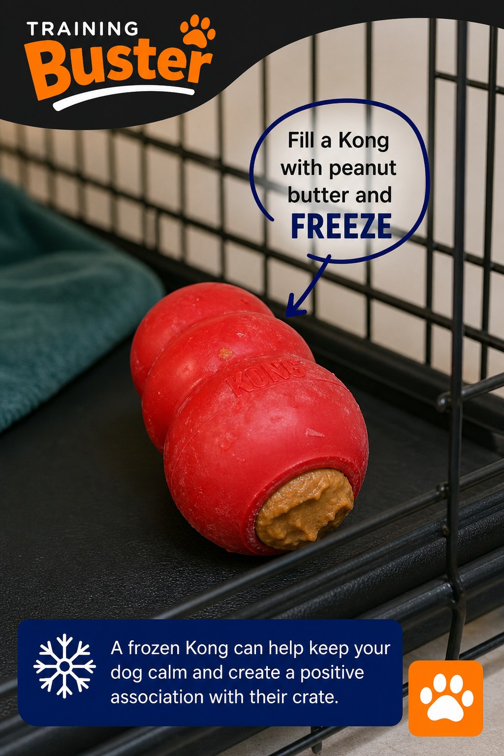 A close-up photo of a red Kong toy stuffed with peanut butter and frozen, sitting on a crate's floor. Alt: Frozen Kong treat placed inside a dog crate to encourage positive association.